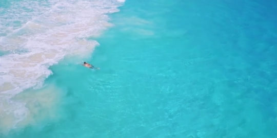 Cancun beach swimmer