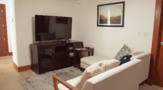 Cancun condo interior tv room wide slow truck right