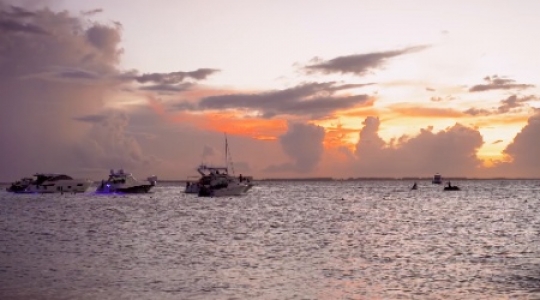 Isla Mujeres boats at sunset static shot - 1 slo mo_1