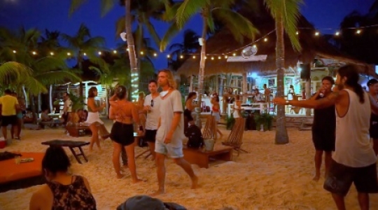 Isla Mujeres people dancing at beach bar  -  3 slo mo