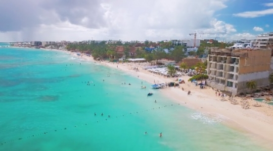 Playa Del Carmen beach flyover pan