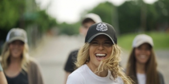 Woman smiling spin walk