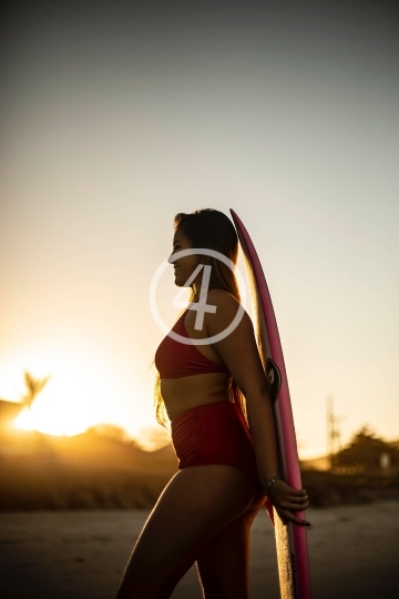 Bikini surf pose