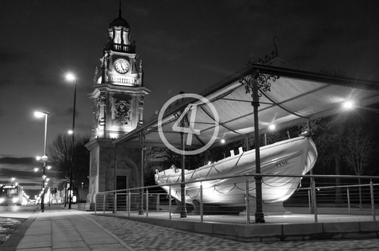 B/W Clock tower and boat