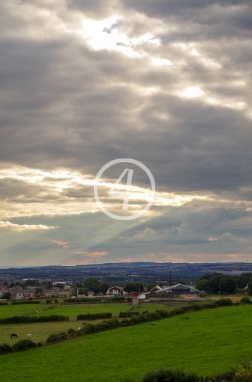 Sun behind the clouds