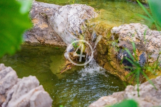 Waterfall into pond