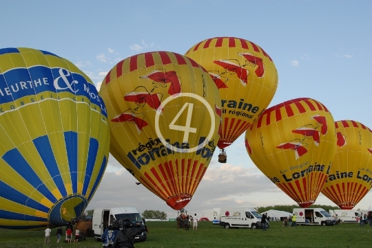 With the balloons 